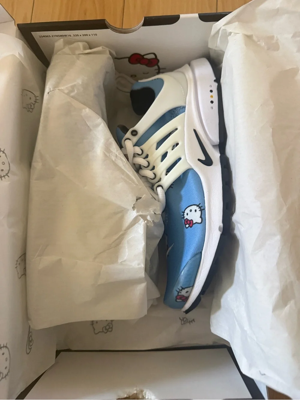 Nike Big Kids Light Blue Hello Kitty Graphic Sneakers with White Accents
